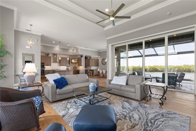 EXCEPTIONAL TWO-STORY HOME IN BSI W/FANTASTIC CANAL BASIN VIEW & on Twin Isles Country Club in Florida - for sale on GolfHomes.com, golf home, golf lot