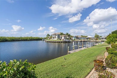 EXCEPTIONAL TWO-STORY HOME IN BSI W/FANTASTIC CANAL BASIN VIEW & on Twin Isles Country Club in Florida - for sale on GolfHomes.com, golf home, golf lot