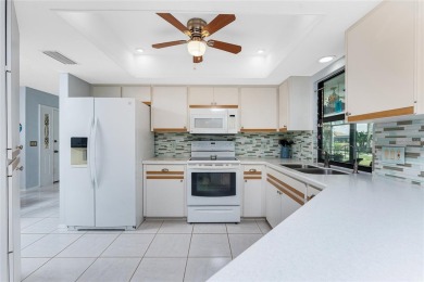 Under contract-accepting backup offers. Charming curb appeal on Pinemoor West Golf Club in Florida - for sale on GolfHomes.com, golf home, golf lot