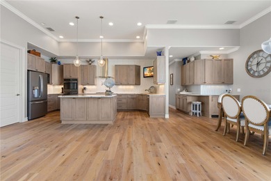 EXCEPTIONAL TWO-STORY HOME IN BSI W/FANTASTIC CANAL BASIN VIEW & on Twin Isles Country Club in Florida - for sale on GolfHomes.com, golf home, golf lot