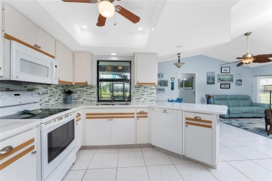 Under contract-accepting backup offers. Charming curb appeal on Pinemoor West Golf Club in Florida - for sale on GolfHomes.com, golf home, golf lot