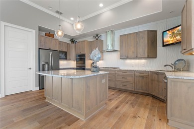 EXCEPTIONAL TWO-STORY HOME IN BSI W/FANTASTIC CANAL BASIN VIEW & on Twin Isles Country Club in Florida - for sale on GolfHomes.com, golf home, golf lot