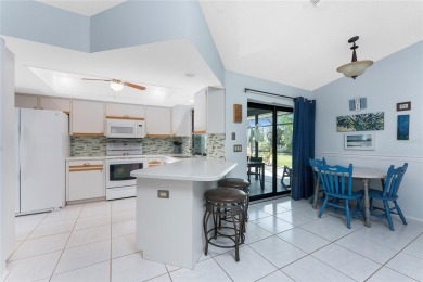 Under contract-accepting backup offers. Charming curb appeal on Pinemoor West Golf Club in Florida - for sale on GolfHomes.com, golf home, golf lot