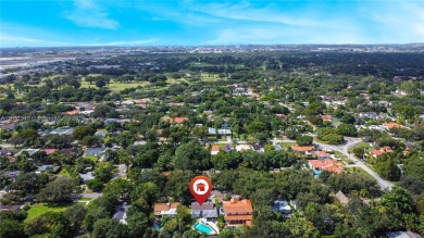 Located in the heart of Miami Springs, this charming home offers on Miami Springs Golf and Country Club in Florida - for sale on GolfHomes.com, golf home, golf lot