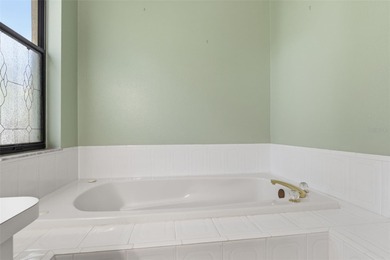 Welcome to resort-style living in the heart of Glen Lakes on Glen Lakes Country Club in Florida - for sale on GolfHomes.com, golf home, golf lot