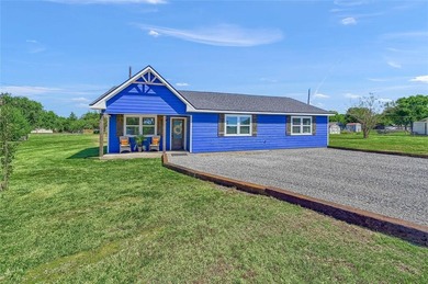 Welcome to your vibrant lake escape in the Simmons Shores on Tanglewood Resort in Texas - for sale on GolfHomes.com, golf home, golf lot