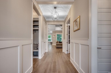 This stunning home, built in 2020 by a local custom builder on Myrtlewood Golf Course and Club  in South Carolina - for sale on GolfHomes.com, golf home, golf lot