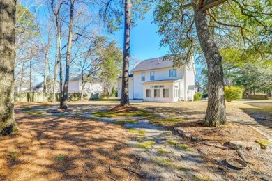 Discover the epitome of Lowcountry living in this elegant on Crowfield Golf and Country Club in South Carolina - for sale on GolfHomes.com, golf home, golf lot