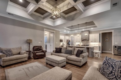 This stunning home, built in 2020 by a local custom builder on Myrtlewood Golf Course and Club  in South Carolina - for sale on GolfHomes.com, golf home, golf lot