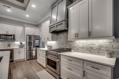 This stunning home, built in 2020 by a local custom builder on Myrtlewood Golf Course and Club  in South Carolina - for sale on GolfHomes.com, golf home, golf lot