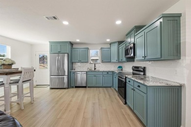 Welcome to your vibrant lake escape in the Simmons Shores on Tanglewood Resort in Texas - for sale on GolfHomes.com, golf home, golf lot