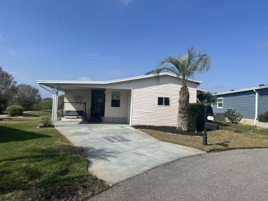 Discover this charming 1996 Homes of Merit "TURNKEY" on Four Lakes Golf Club in Florida - for sale on GolfHomes.com, golf home, golf lot