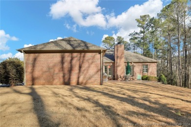 Nestled in gated Carolina Trace, this all brick home boasts 3 on Carolina Trace Country Club in North Carolina - for sale on GolfHomes.com, golf home, golf lot