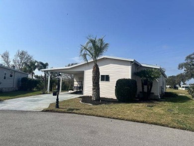 Discover this charming 1996 Homes of Merit "TURNKEY" on Four Lakes Golf Club in Florida - for sale on GolfHomes.com, golf home, golf lot