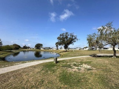 Discover this charming 1996 Homes of Merit "TURNKEY" on Four Lakes Golf Club in Florida - for sale on GolfHomes.com, golf home, golf lot