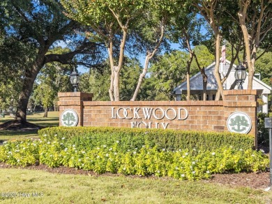Discover your own piece of paradise in the gated, waterfront on Lockwood Folly Country Club in North Carolina - for sale on GolfHomes.com, golf home, golf lot