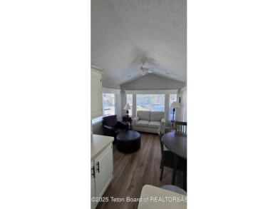 Completely updated park model with a spacious bonus room located on Star Valley RV Golf Course in Wyoming - for sale on GolfHomes.com, golf home, golf lot