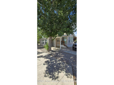 Completely updated park model with a spacious bonus room located on Star Valley RV Golf Course in Wyoming - for sale on GolfHomes.com, golf home, golf lot