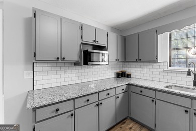 Don't miss your chance to own this beautifully updated 3BR/2BA on Golf Club of Macon in Georgia - for sale on GolfHomes.com, golf home, golf lot