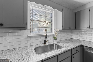 Don't miss your chance to own this beautifully updated 3BR/2BA on Golf Club of Macon in Georgia - for sale on GolfHomes.com, golf home, golf lot