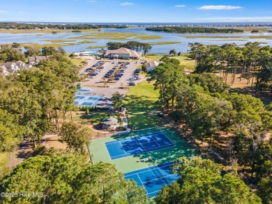 Discover your own piece of paradise in the gated, waterfront on Lockwood Folly Country Club in North Carolina - for sale on GolfHomes.com, golf home, golf lot