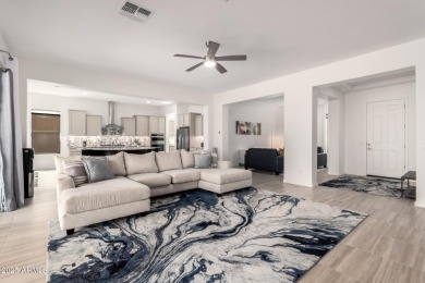 AMAZING RESORT LIVING w/ OPEN WASH VIEWS! Enter this beautifully on Poston Butte Golf Club in Arizona - for sale on GolfHomes.com, golf home, golf lot