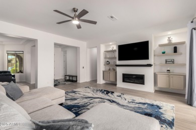 AMAZING RESORT LIVING w/ OPEN WASH VIEWS! Enter this beautifully on Poston Butte Golf Club in Arizona - for sale on GolfHomes.com, golf home, golf lot