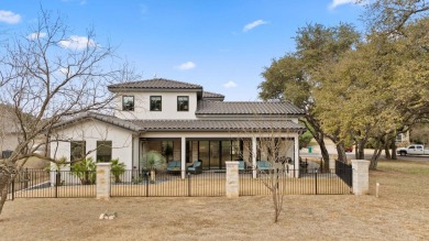 Stunning 4 bed/4.5 bath residence is thoughtfully designed for on Slick Rock Golf Course - Horseshoe Bay in Texas - for sale on GolfHomes.com, golf home, golf lot