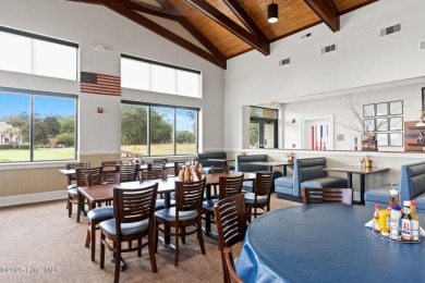Discover your own piece of paradise in the gated, waterfront on Lockwood Folly Country Club in North Carolina - for sale on GolfHomes.com, golf home, golf lot