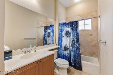 BEAUTIFUL ARTHUR RUTENBERG CONCRETE BLOCK CONSTRUCTED HOME. THIS on Queens Harbour Yacht and Country Club in Florida - for sale on GolfHomes.com, golf home, golf lot