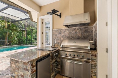 BEAUTIFUL ARTHUR RUTENBERG CONCRETE BLOCK CONSTRUCTED HOME. THIS on Queens Harbour Yacht and Country Club in Florida - for sale on GolfHomes.com, golf home, golf lot