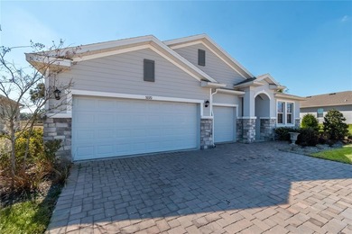 Built in 2023, this eye-catching home has plenty of curb appeal on Trilogy at Ocala Preserve in Florida - for sale on GolfHomes.com, golf home, golf lot