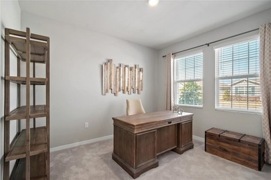 Built in 2023, this eye-catching home has plenty of curb appeal on Trilogy at Ocala Preserve in Florida - for sale on GolfHomes.com, golf home, golf lot