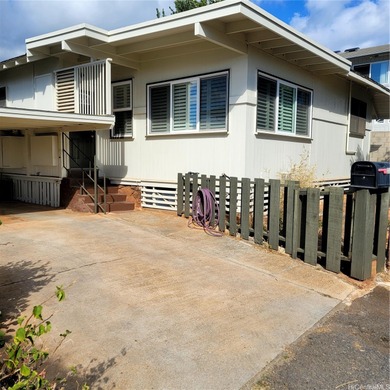 Charming 3-bedroom, 1.5-bath home in a prime Kapahulu location on Ala Wai Golf Course in Hawaii - for sale on GolfHomes.com, golf home, golf lot