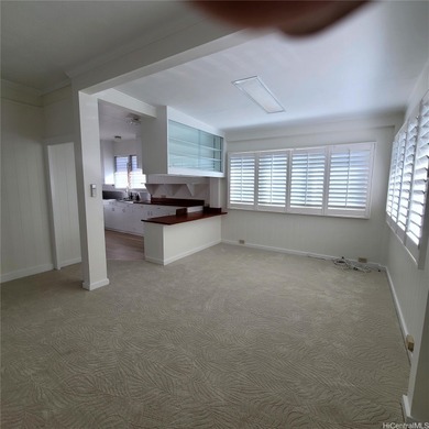 Charming 3-bedroom, 1.5-bath home in a prime Kapahulu location on Ala Wai Golf Course in Hawaii - for sale on GolfHomes.com, golf home, golf lot