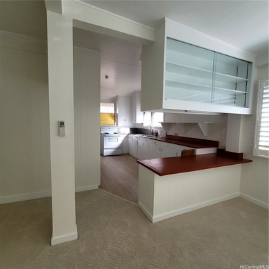 Charming 3-bedroom, 1.5-bath home in a prime Kapahulu location on Ala Wai Golf Course in Hawaii - for sale on GolfHomes.com, golf home, golf lot