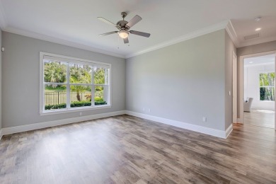 Welcome to your tropical escape - your private oasis of peace on Oak Harbor Country Club in Florida - for sale on GolfHomes.com, golf home, golf lot