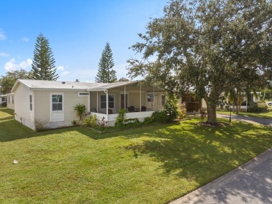 Rarely available large 3/2 + Den home featuring vaulted ceilings on Barefoot Bay Golf Course in Florida - for sale on GolfHomes.com, golf home, golf lot