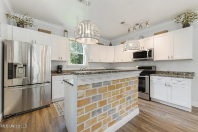 Coastal Charm Just Minutes from Downtown Bay St. Louis -Nestled on The Bridges Golf Club At Hollywood Casino in Mississippi - for sale on GolfHomes.com, golf home, golf lot