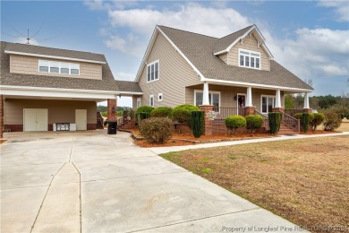 This craftsman-style home, is situated along the greens of on TimberLake Golf Club in North Carolina - for sale on GolfHomes.com, golf home, golf lot