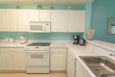 Turnkey 2 Bed | 2 Bath Condo with Golf  Water Views in on Tidewater Golf Club and Plantation in South Carolina - for sale on GolfHomes.com, golf home, golf lot