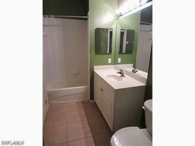 Stunning Second-Floor Condominium with Panoramic Golf Course on Gateway Golf and Country Club in Florida - for sale on GolfHomes.com, golf home, golf lot