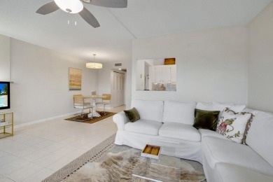SPECTACULAR CONDO WITH AMAZING WATER VIEW FROM THE 4TH FLOOR on Hillsboro Pines Golf in Florida - for sale on GolfHomes.com, golf home, golf lot