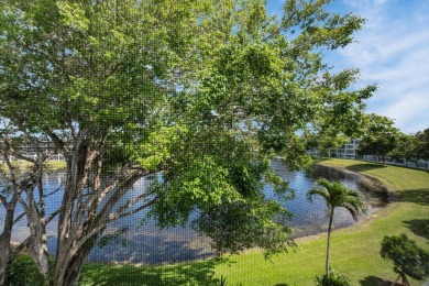 SPECTACULAR CONDO WITH AMAZING WATER VIEW FROM THE 4TH FLOOR on Hillsboro Pines Golf in Florida - for sale on GolfHomes.com, golf home, golf lot