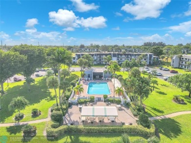 Indulge in the essence of modern living within this meticulous on Fountains Golf and Country Club in Florida - for sale on GolfHomes.com, golf home, golf lot
