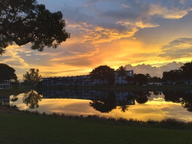 SPECTACULAR CONDO WITH AMAZING WATER VIEW FROM THE 4TH FLOOR on Hillsboro Pines Golf in Florida - for sale on GolfHomes.com, golf home, golf lot