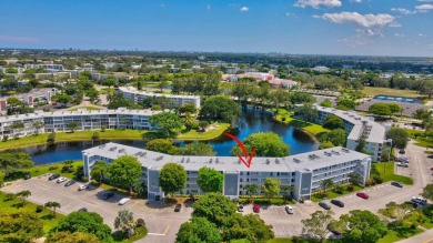 SPECTACULAR CONDO WITH AMAZING WATER VIEW FROM THE 4TH FLOOR on Hillsboro Pines Golf in Florida - for sale on GolfHomes.com, golf home, golf lot