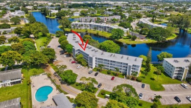 SPECTACULAR CONDO WITH AMAZING WATER VIEW FROM THE 4TH FLOOR on Hillsboro Pines Golf in Florida - for sale on GolfHomes.com, golf home, golf lot