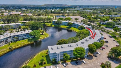 SPECTACULAR CONDO WITH AMAZING WATER VIEW FROM THE 4TH FLOOR on Hillsboro Pines Golf in Florida - for sale on GolfHomes.com, golf home, golf lot