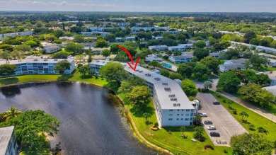 SPECTACULAR CONDO WITH AMAZING WATER VIEW FROM THE 4TH FLOOR on Hillsboro Pines Golf in Florida - for sale on GolfHomes.com, golf home, golf lot
